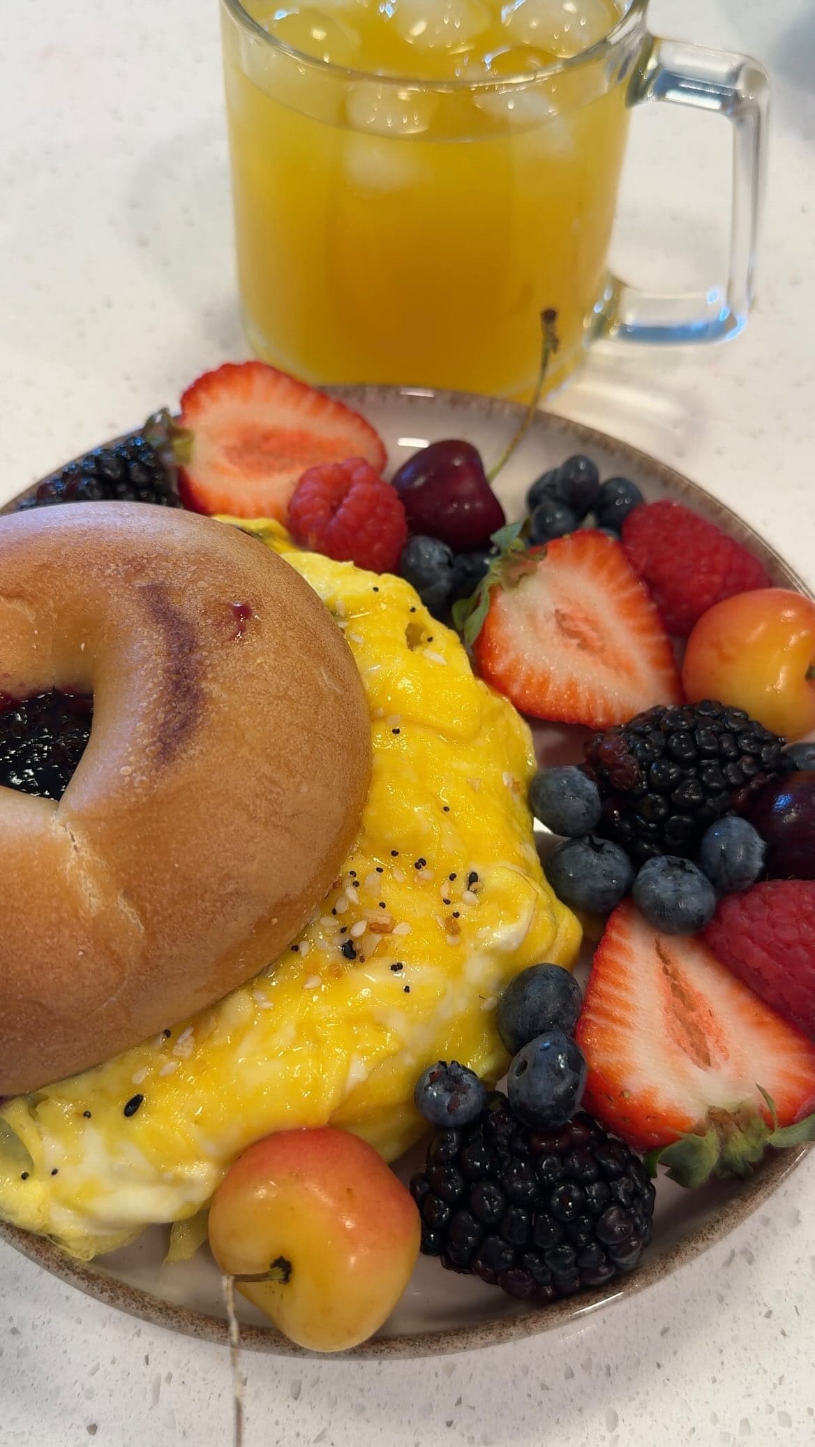 Breakfast Bagel With Scrambled Eggs And Berries